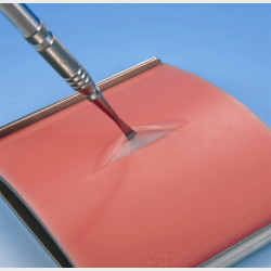 Incisions- og sutureringstrningsblok